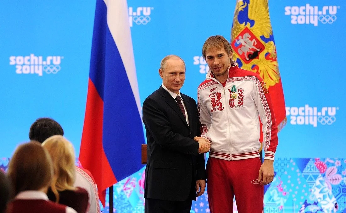 Vladimir Putin and Anton Shipulin. Photo: <a href="http://www.kremlin.ru/events/president/news/20331/photos/18909" rel="noopener noreferrer" title="http://www.kremlin.ru/events/president/news/20331/photos/18909">the Kremlin</a>