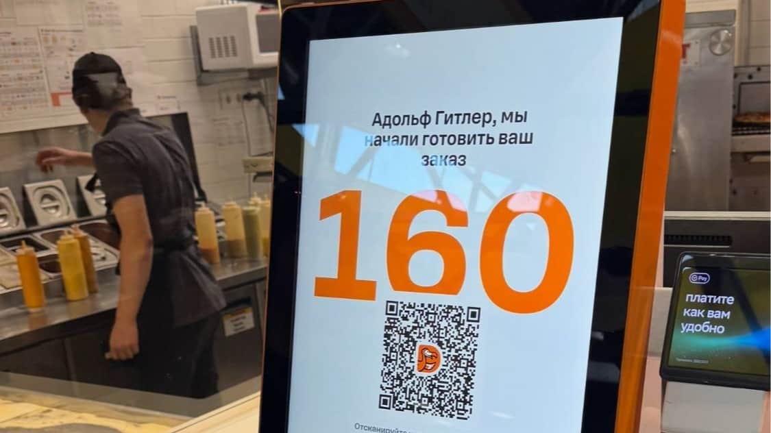 A screen reads ”Adolf Hitler, we’re preparing your order”, in Nizhny Tagil, Russia. Photo: Telegram / Svalov Pishet