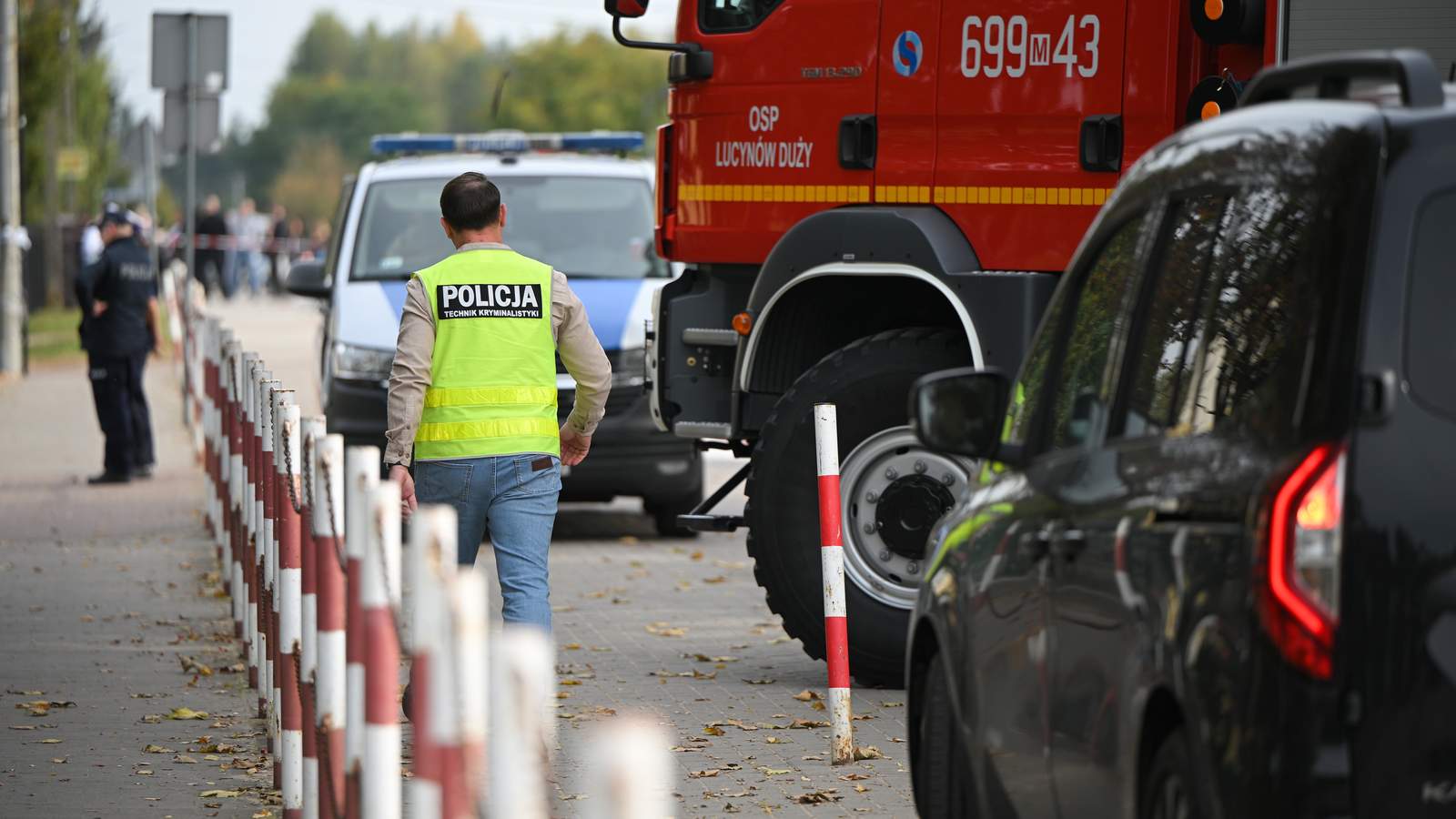 Польские спасательные службы после атаки на школу 8 октября. Фото: Marcin Obara / EPA