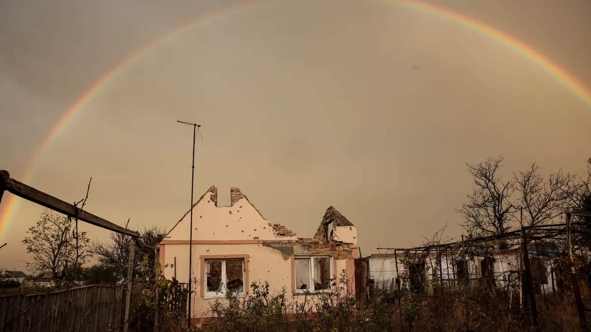A rainbow over the ruins of a house in the village of Posad-Pokrovske in Ukraine’s Kherson region, 1 November 2023. Photo: EPA-EFE / Oleg Petrasyuk
