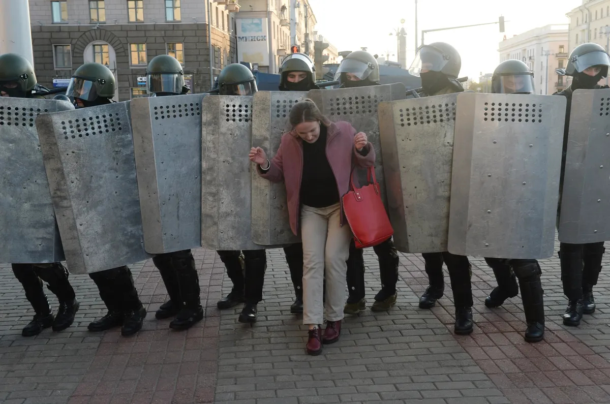 Riot police surround a protester during a rally against the presidential election results in Minsk, Belarus, 20 September 2020. Photo: EPA 