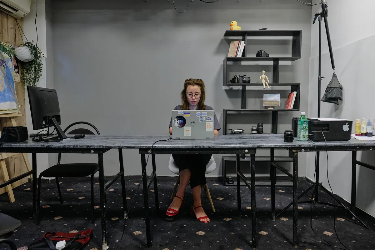 Darina Mayatskaya, coordinator of Kovcheg, in Armenia, in her workspace in Yerevan, Armenia, June 2024. Photo: Fabio Lovati