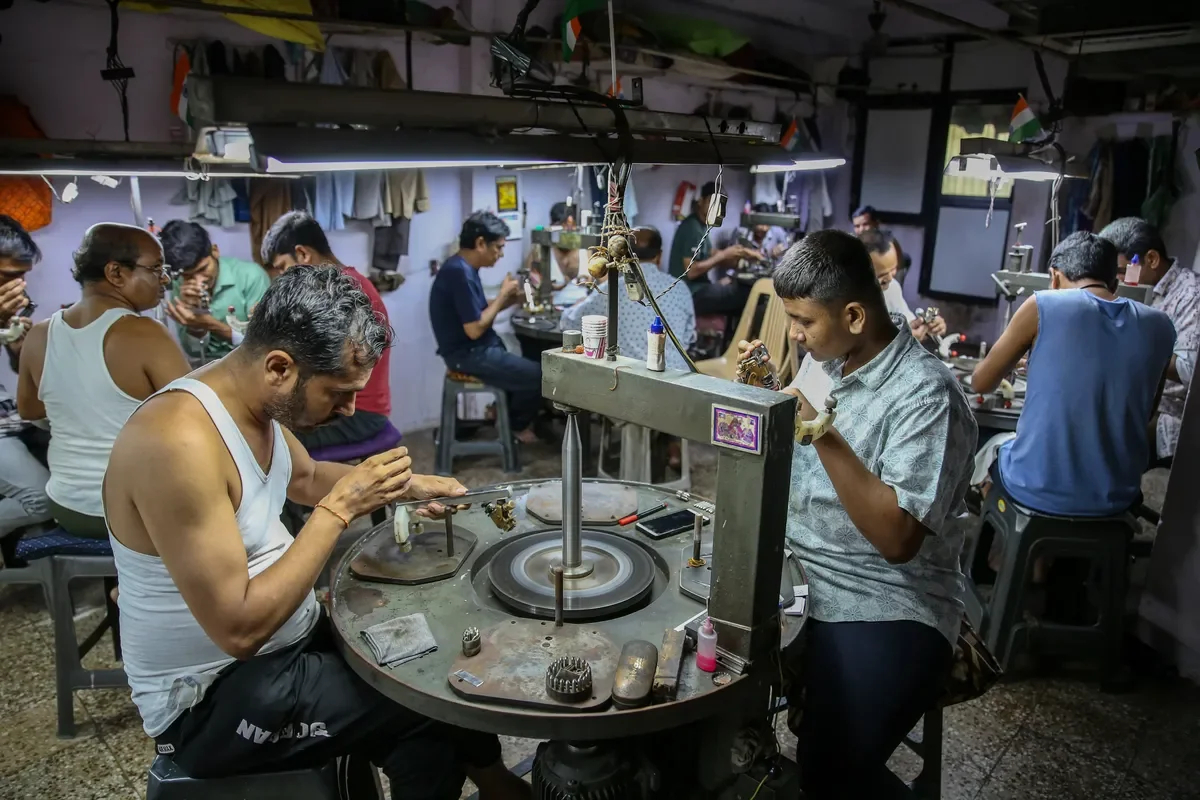 Diamond cutting in Surat, India. Photo: Divyankani Solanki / EPA-EFE