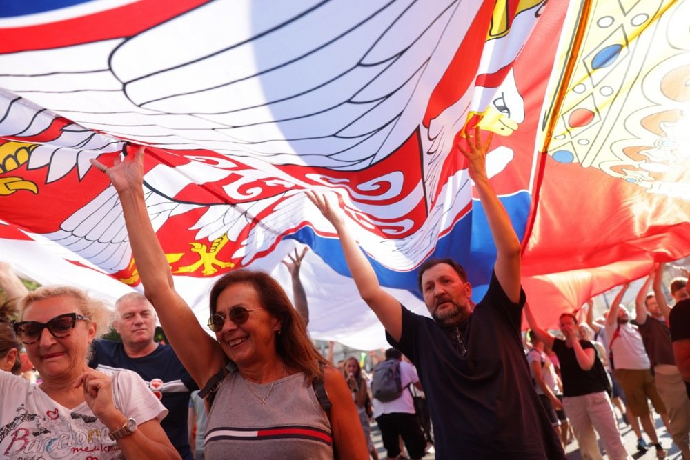 Protesters carry a giant Serbian flag during a student-led rally in Belgrade, Serbia, on 28 June 2025. Photo: EPA/ANDREJ CUKIC